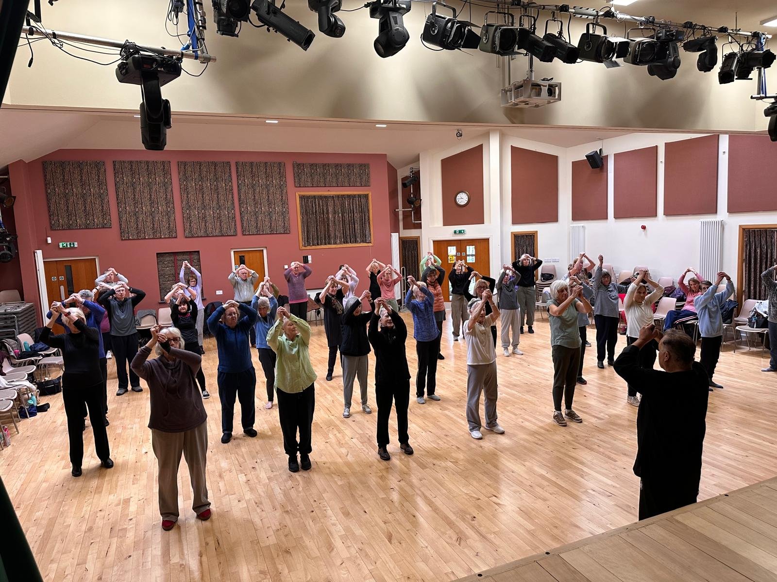 Qigong class in hall